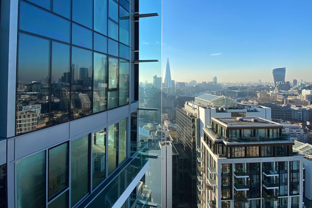 View from Cashmere Wharf across the London skyline towards The Shard and 20 Fenchurch Street