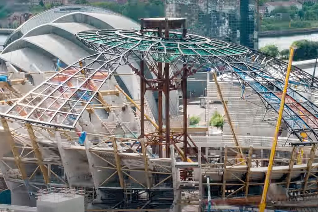 Radial steel roof structure of the OVO Hydro being assembled on a central temporary support tower